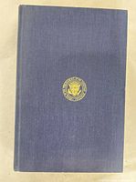 Front cover showing blue cloth binding and gilt presidential seal