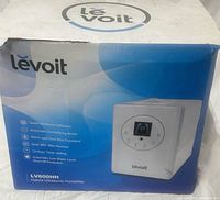 Front of boxed Levoit LV600HH humidifier