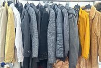 Rack showing 14 assorted women’s jackets