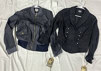 Both jackets front view showing styles and tags