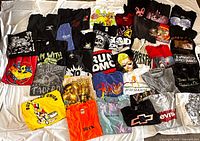 All 40 T-shirts laid out to show quantity and variety