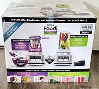 Front of retail box showing Ninja Foodi Smoothie Bowl Maker & Nutrient Extractor contents and features