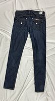 Full back view showing entire jeans