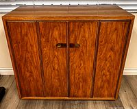 Front view of Drexel wood bar cabinet