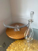 Crystal footed dish on stand and glass decanter with stopper