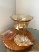 Pedestal trifle bowl, shallow bowl and freeform dish on wooden stand