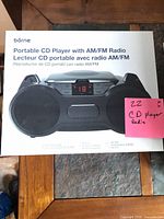 Front of retail box showing boombox image and specs