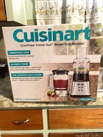 Front of sealed retail box showing model and images