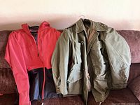 Dakine red shell and olive field jacket side by side
