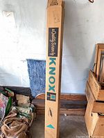 Full view of original Knox branded cardboard box containing screen