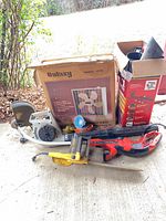 Overall lot with boxed Galaxy fan, Craftsman trimmer, blower, yellow tool, accessories