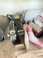 Meat grinder, plastic bags, cabinet shelf