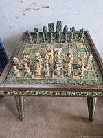 Top view showing chess table surface and all pieces