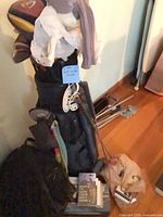 Golf bag filled with clubs, headcovers, accessories visible