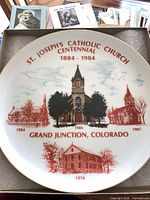 Front of commemorative porcelain plate showing design and text