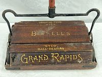 Top view showing Bissell’s branding and model text on wood body