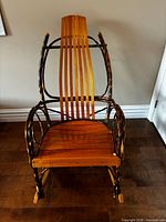 Front view of wooden bentwood slat rocking chair