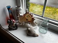 All six décor items on windowsill