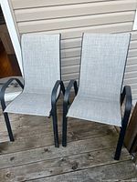 Front view of both lawn chairs on deck