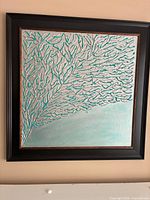 Full view of framed artwork on wall