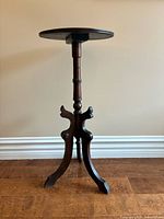 Full view of wooden pedestal plant stand