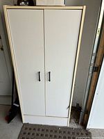 Cabinet front view with closed doors