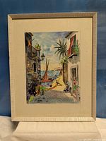 Front view of framed watercolor showing image, mat and frame