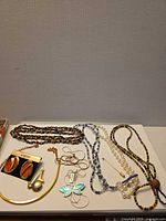 All jewellery items laid out showing variety
