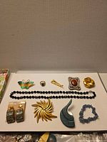 All ten jewellery pieces laid out