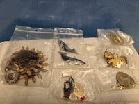 All six jewellery items in separate bags