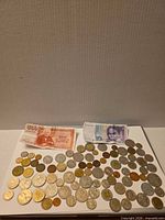 Overview of coins and two banknotes