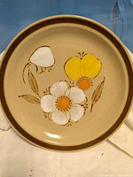 Full view of plate showing floral design and rim
