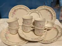 Full view of all 14 Pfaltzgraff Tea Rose pieces