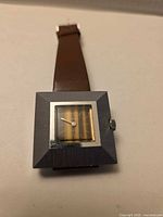 Front view of square Vendome watch with brown strap
