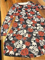 Full view of the dress front showing print, shape, sleeves