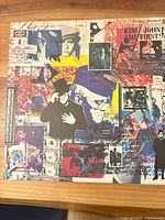 Front view of Elton John collage slipcase