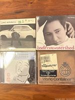 All four CD packages front view