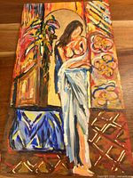 Full view of unframed acrylic and gold leaf painting showing female nude and background patterns