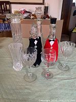 All glass items grouped on table