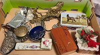 Overview of assorted items in box showing all pieces