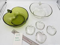 Group of two large apple-shaped bowls and four small dishes