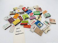 All matchbooks spread out to show quantity and front cover designs