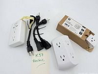 Group shot of all outlet adapters and extension cords