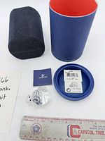 All contents: crystal hermit crab, box components, certificate, ruler for scale