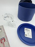 Overall view of crystal fish figurine with box and lid