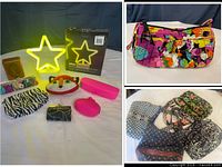 Group shot of neon star light with box, Vera Bradley wristlet, assorted pouches, and wooden jewelry box