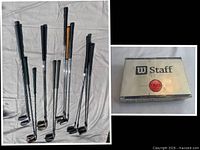 Group of eight left-hand irons and wedges standing upright