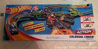 Front of box showing Hot Wheels Colossal Crash artwork and branding