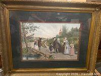 Framed landscape print with gilt frame and glass
