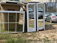 Group shot showing six-pane window sash and two mirrored panels